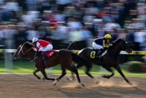 Durban July 2026 tips - Tight photo finish with horses racing neck and neck at Greyville racecourse